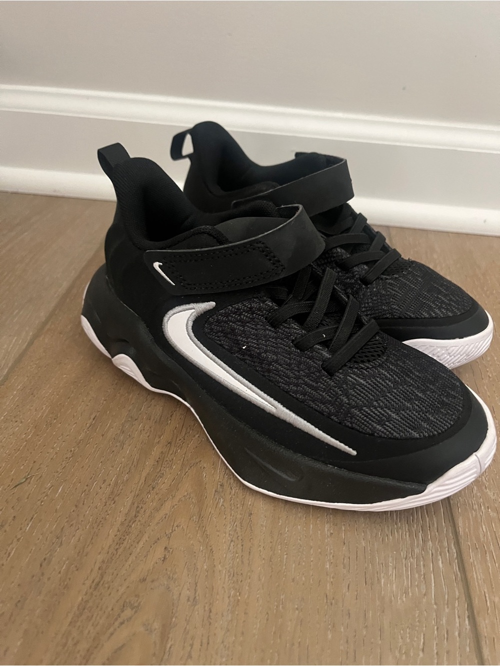 Nike Kids Black Sneakers with White Swoosh